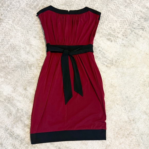Maggie London stretch knit, dark red and black tie dress with pockets. Size 4. - Picture 2 of 4